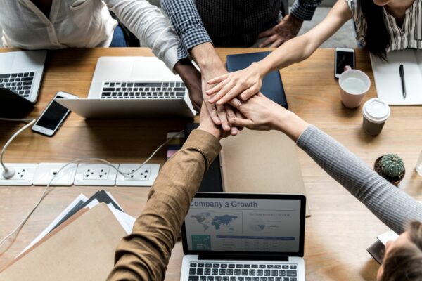 team-business-people-stacking-hands